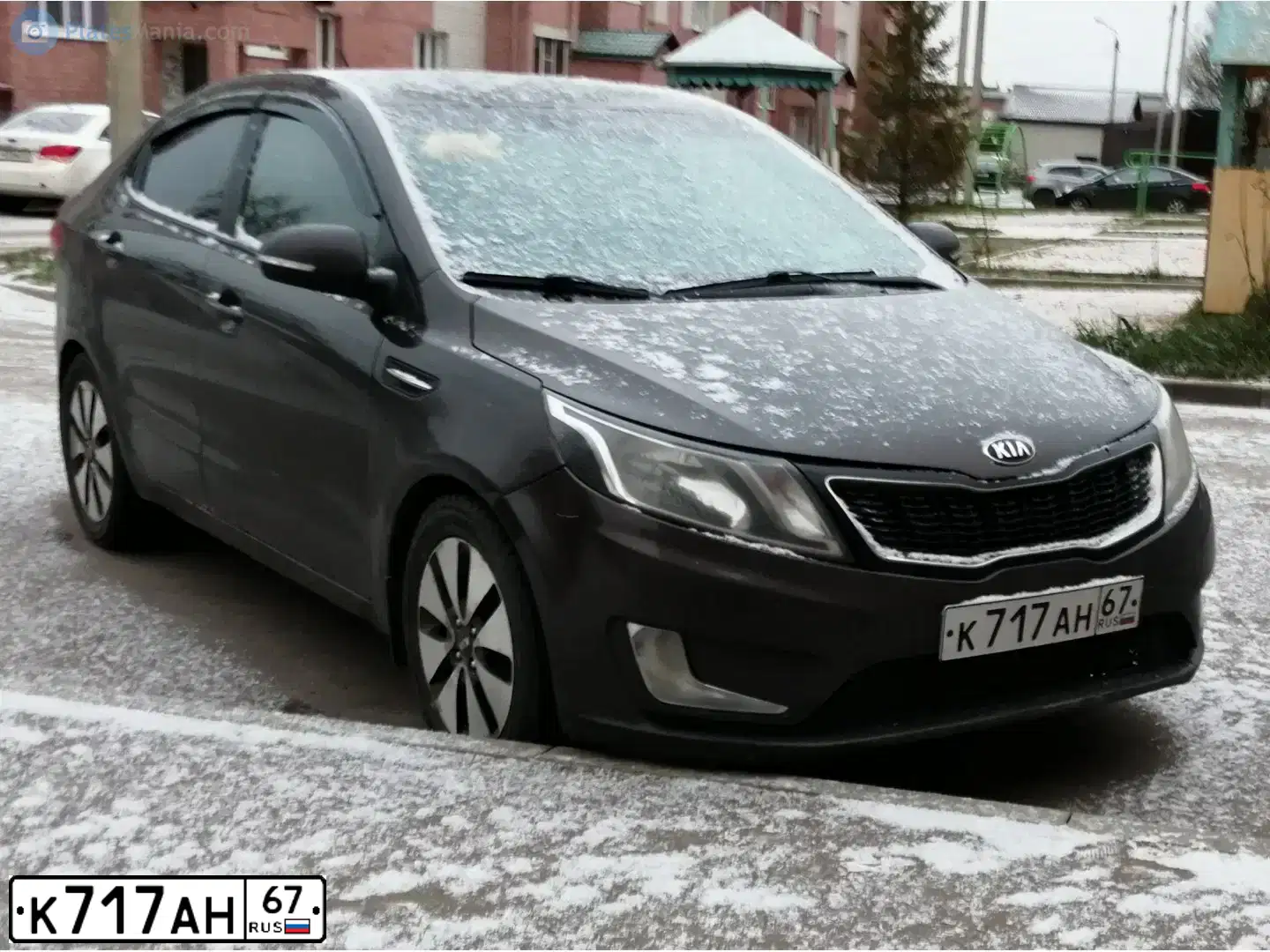 Фото автомобиля KIA RIO, 2014 — госномер К717АН67. Цвет: Коричневый
