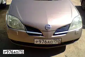 Фото автомобиля NISSAN PRIMERA, 2004 — госномер Р976АО750. Цвет: БЕЖЕВЫЙ