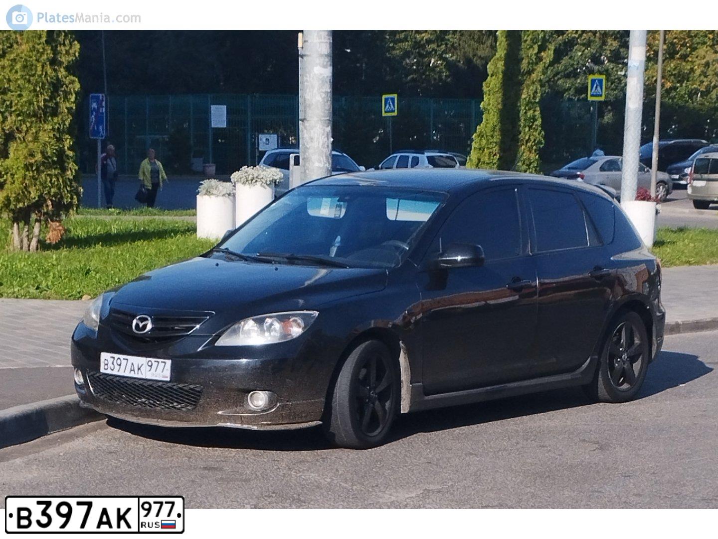 Фото автомобиля MAZDA 3, 2005 — госномер В397АК977. Цвет: ЧЕРНЫЙ