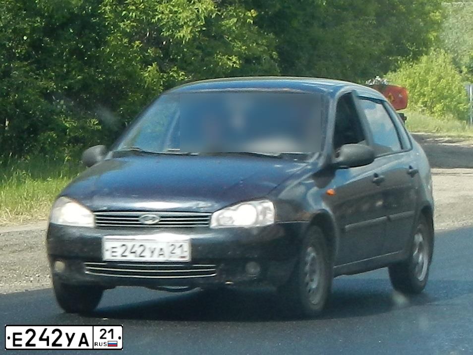 Фото автомобиля LADA 1118 KALINA, 2008 — госномер Е242УА21. Цвет: ТЕМНО СИНЕ-ФИОЛЕТОВЫЙ