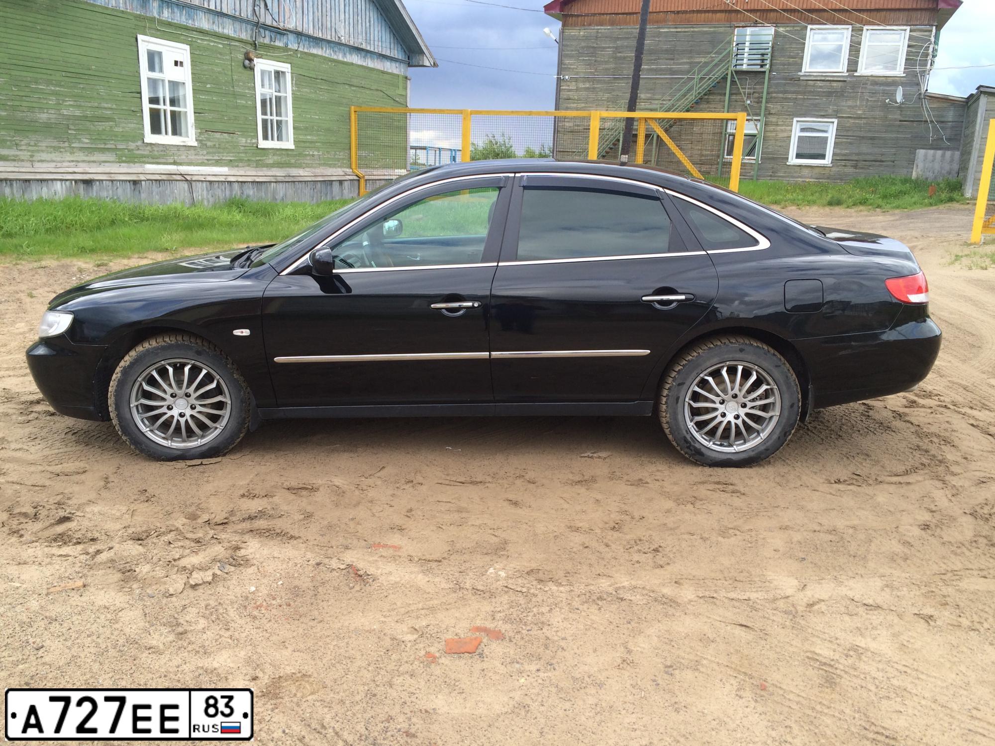 Фото автомобиля HYUNDAI GRANDEUR, 2006 — госномер А727ЕЕ83. Цвет: ЧЕРНЫЙ