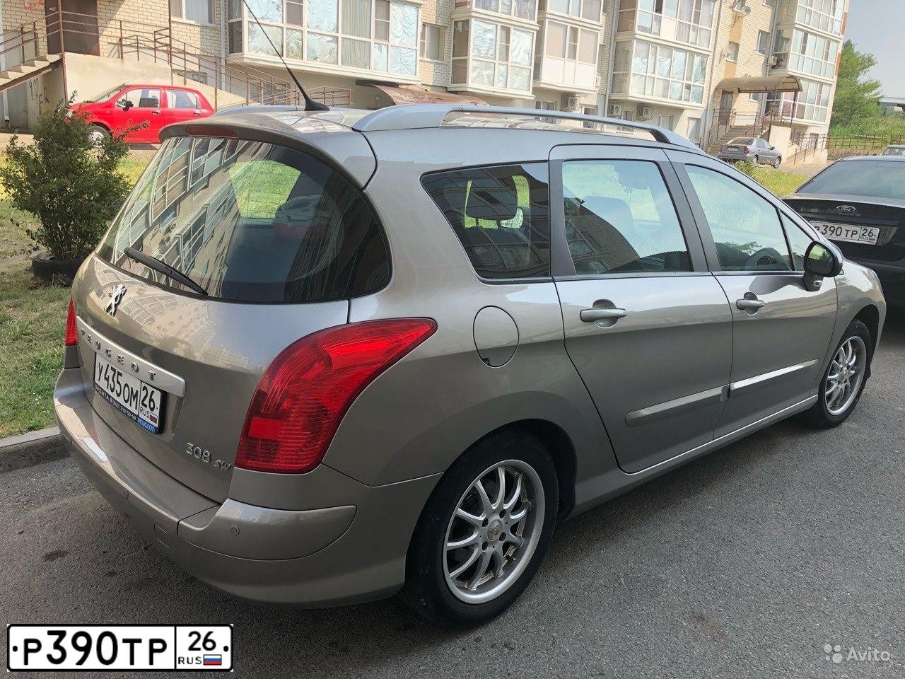 Фото автомобиля FORD FOCUS, 2006 — госномер Р390ТР26. Цвет: ЧЕРНЫЙ