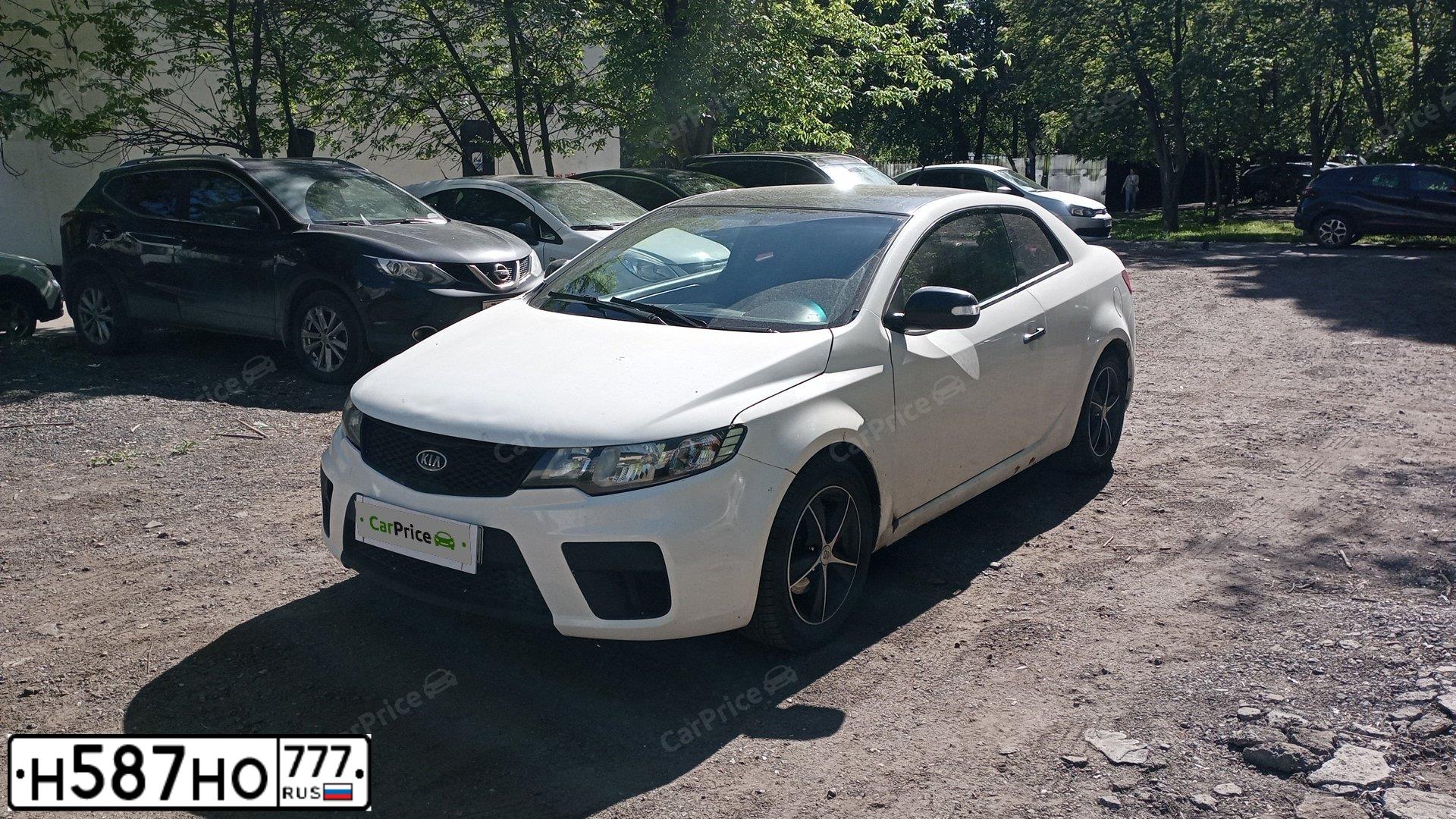 Фото автомобиля KIA CERATO, 2010 — госномер К512ОА790. Цвет: Белый