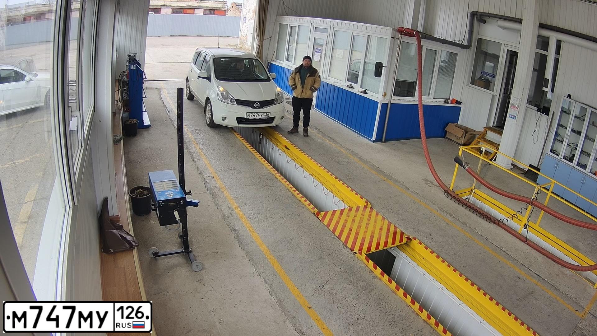 Фото автомобиля NISSAN NOTE, 2011 — госномер К255УТ134. Цвет: Белый