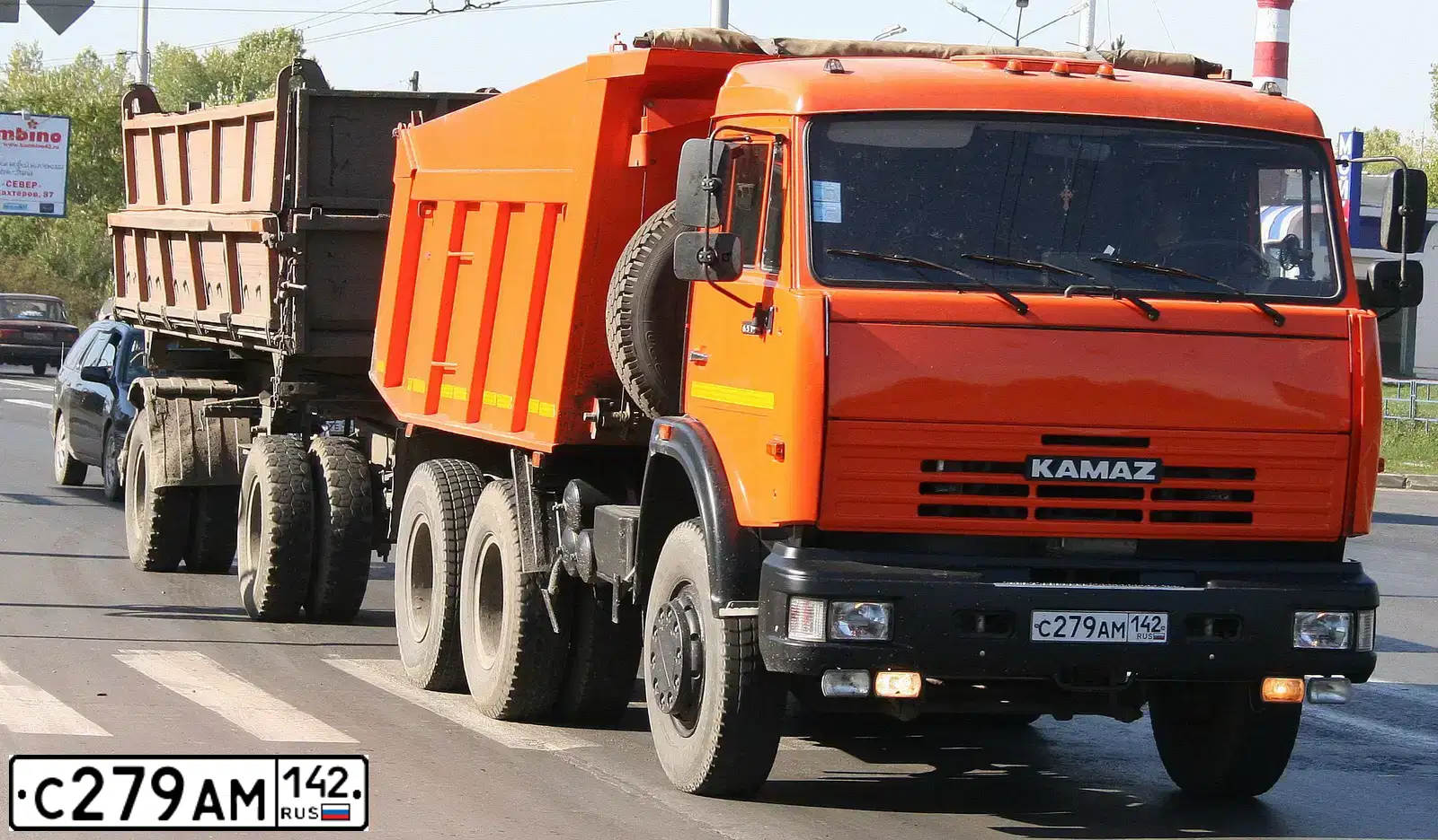 Фото автомобиля KAMAZ 65115 /6X4/, 2011 — госномер С279АМ142. Цвет: ОРАНЖЕВЫЙ