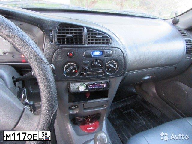 Фото автомобиля MITSUBISHI LANCER, 1997 — госномер М117ОЕ58. Цвет: Темно-синий