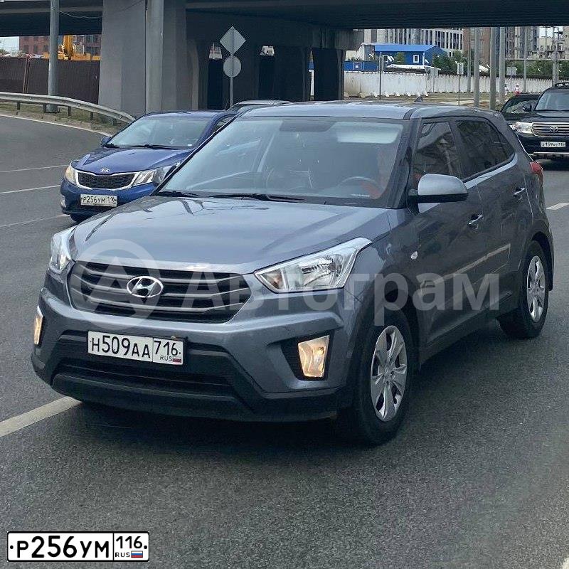 Фото автомобиля KIA RIO, 2012 — госномер Р256УМ116. Цвет: синий