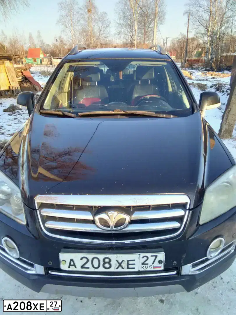 Фото автомобиля DAEWOO WINSTORM, 2008 — госномер Х192АМ65. Цвет: ЧЕРНЫЙ