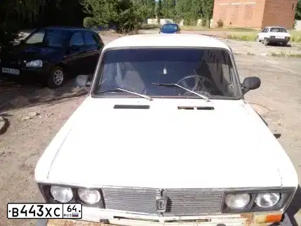Фото автомобиля LADA 1119 KALINA, 2011 — госномер К977НЕ164. Цвет: Сине-Черный