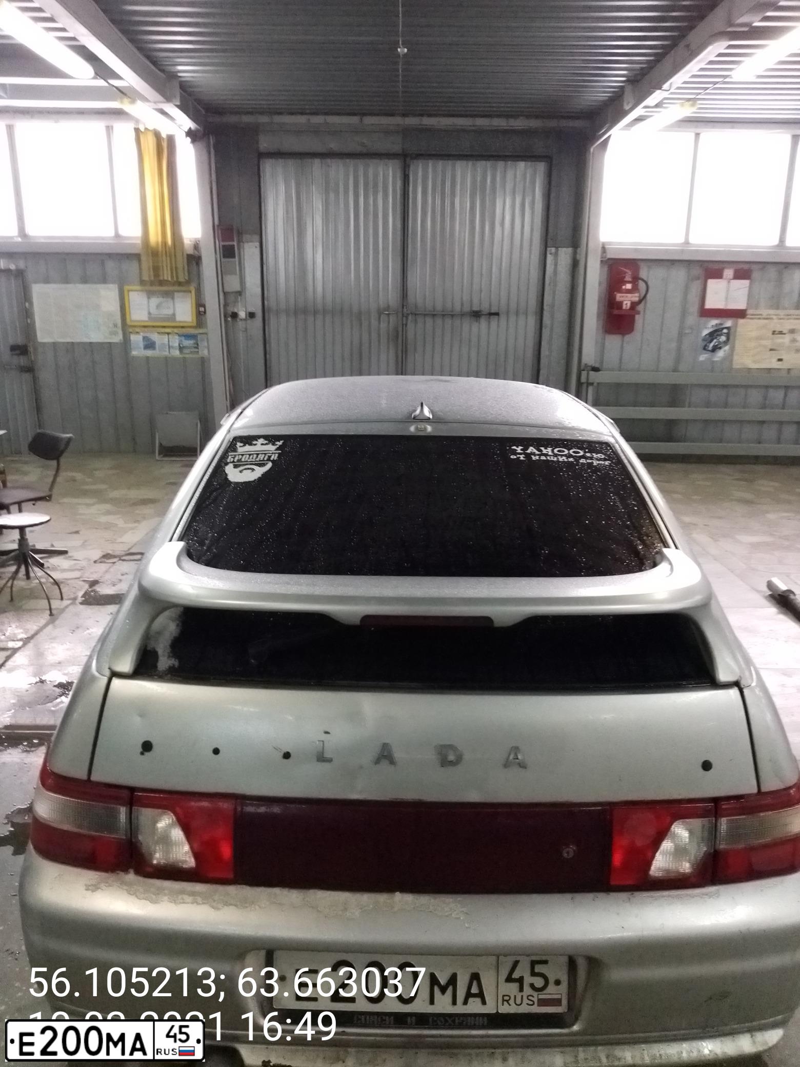 Фото автомобиля LADA 2112, 2001 — госномер Е200МА45. Цвет: СВЕТЛО-СЕРЕБРИСТЫЙ МЕТАЛЛ