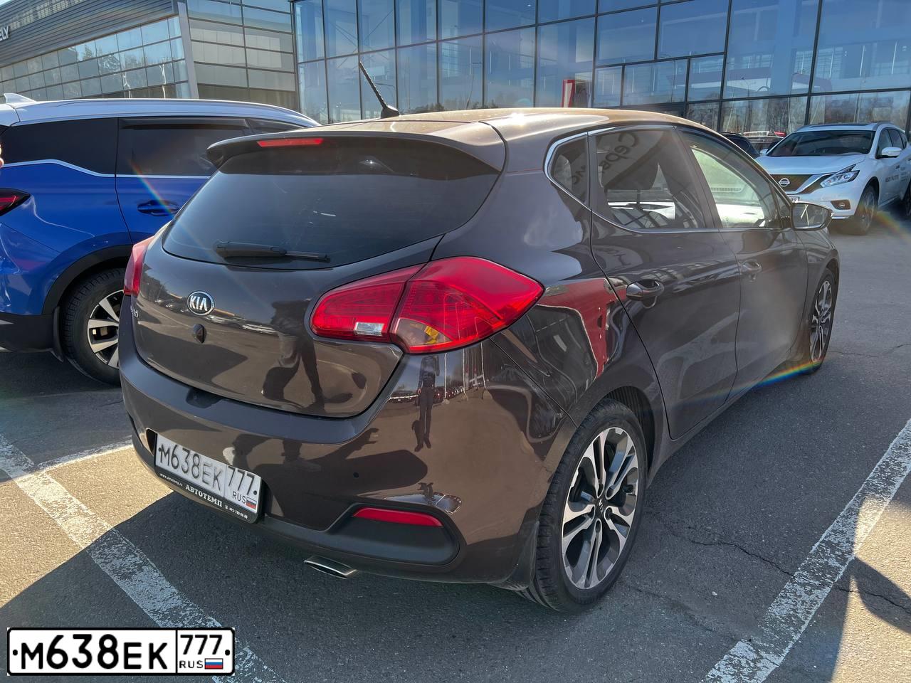 Фото автомобиля KIA CEE'D, 2014 — госномер М117ОЕ134. Цвет: Коричневый