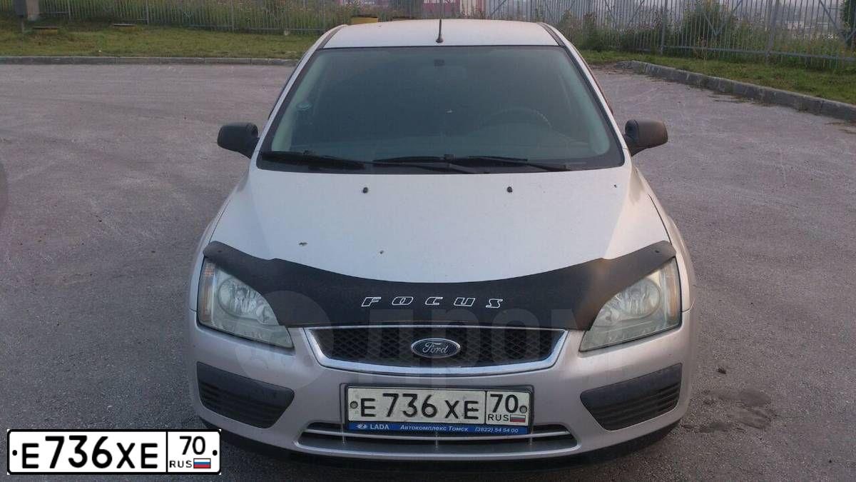 Фото автомобиля FORD FOCUS, 2006 — госномер Е736ХЕ70. Цвет: серебристый