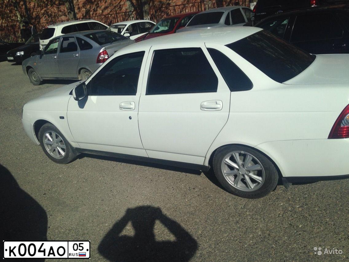 Фото автомобиля FORD FOCUS, 2007 — госномер К004АО05. Цвет: Светло-Серо-Голубой
