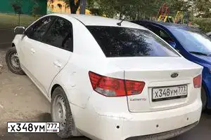 Фото автомобиля KIA CERATO, 2010 — госномер Х348УМ777. Цвет: БЕЛЫЙ