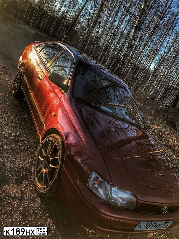 Фото автомобиля TOYOTA CARINA, 1992 — госномер Е987ЕА177. Цвет: Красный