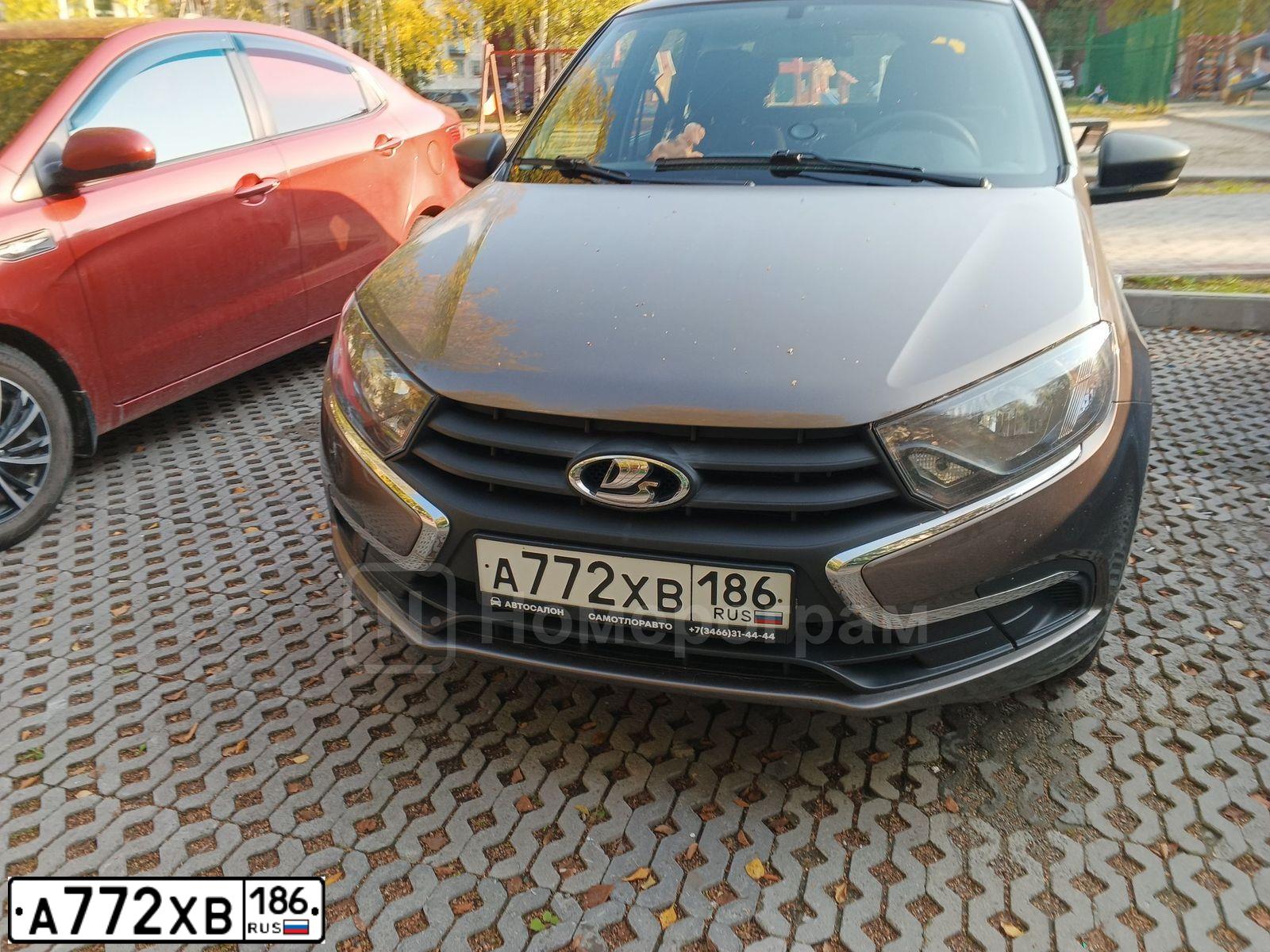 Фото автомобиля LADA 2192 KALINA, 2018 — госномер А772ХВ186. Цвет: ЗОЛОТИСТО-КОРИЧНЕВЫЙ