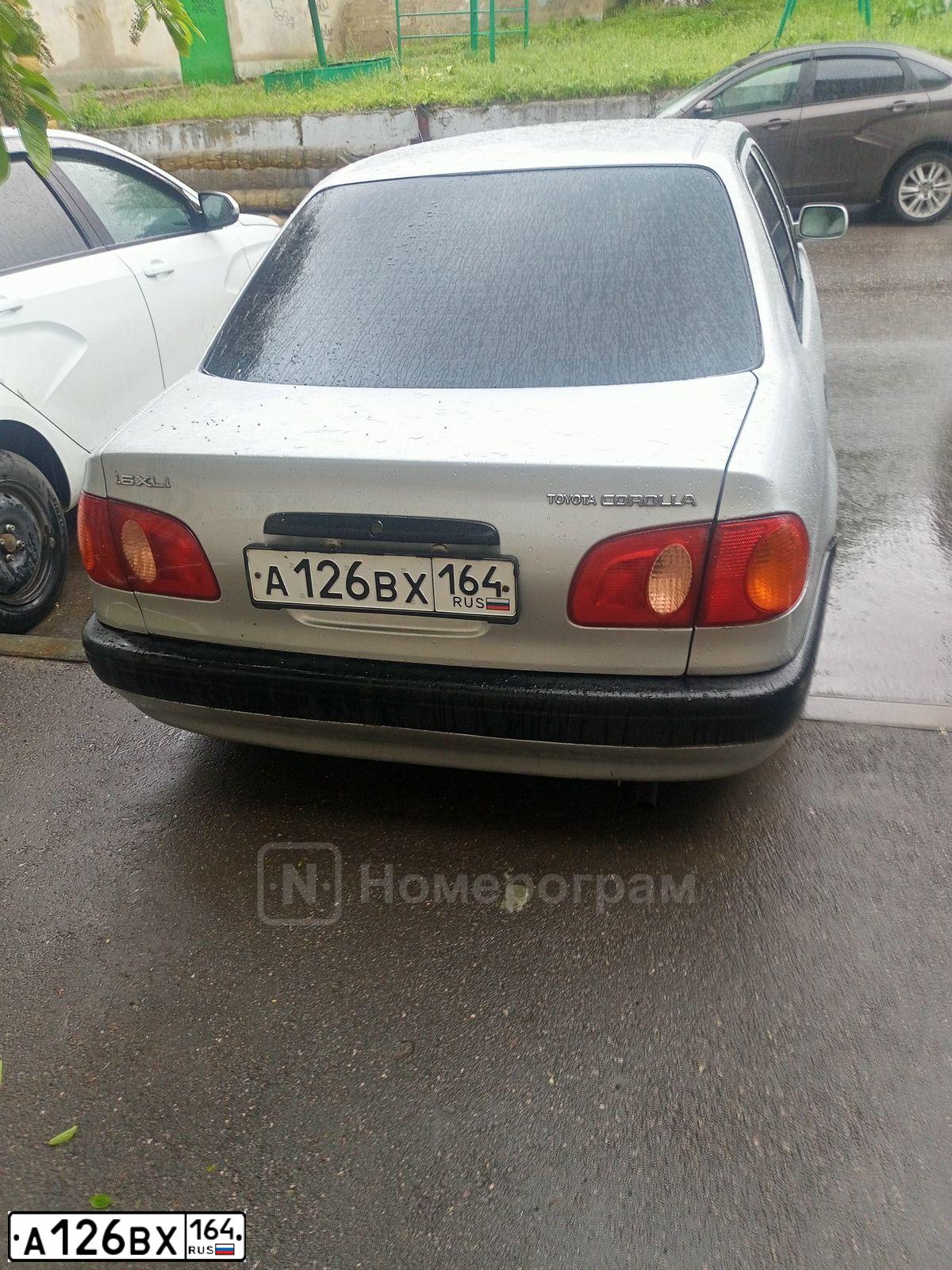 Фото автомобиля TOYOTA COROLLA, 1998 — госномер А126ВХ164. Цвет: СЕРЕБРИСТЫЙ