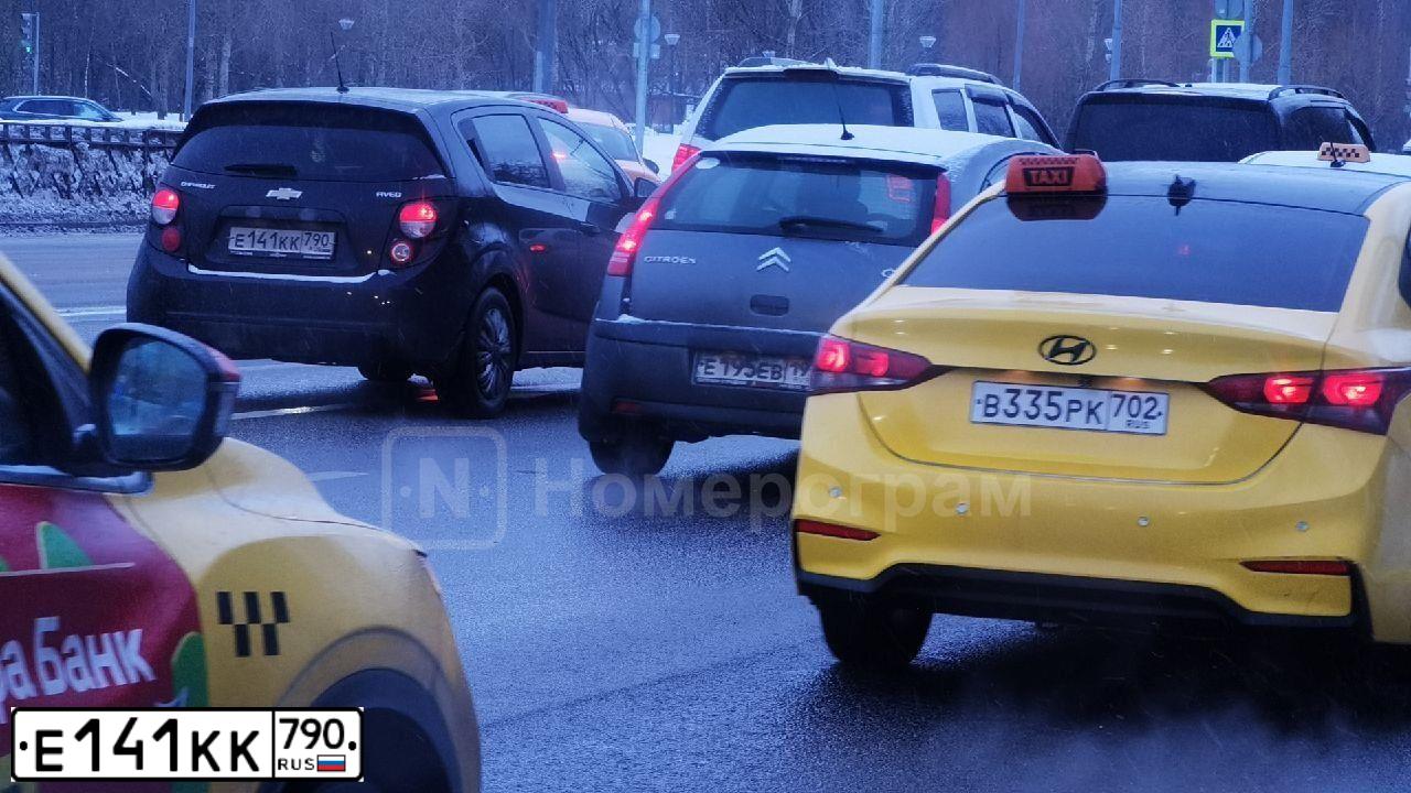 Фото автомобиля CHEVROLET AVEO, 2012 — госномер Т241НС39. Цвет: ЧЕРНЫЙ