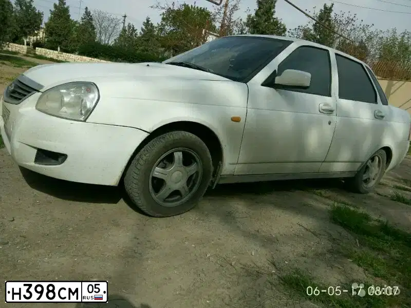 Фото автомобиля LADA 2170 PRIORA, 2011 — госномер М011МХ05. Цвет: Белый