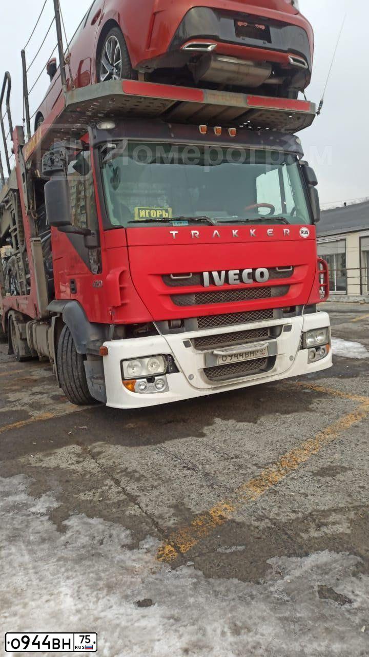 Фото автомобиля IVECO STRALIS, 2011 — госномер Н961СВ75. Цвет: Красный