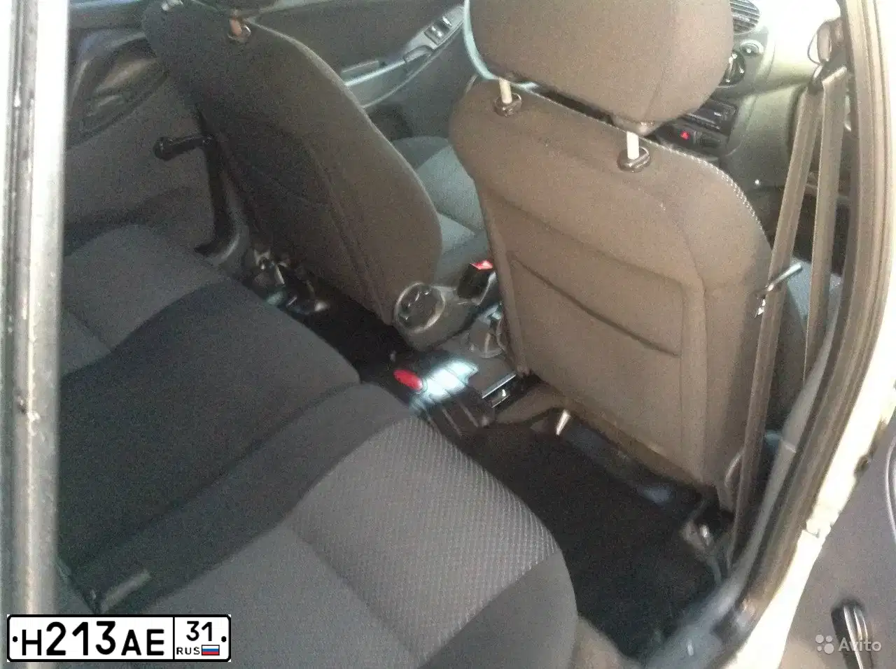 Фото автомобиля LADA 1117 KALINA, 2012 — госномер Н213АЕ31. Цвет: СЕРО-БЕЖЕВЫЙ