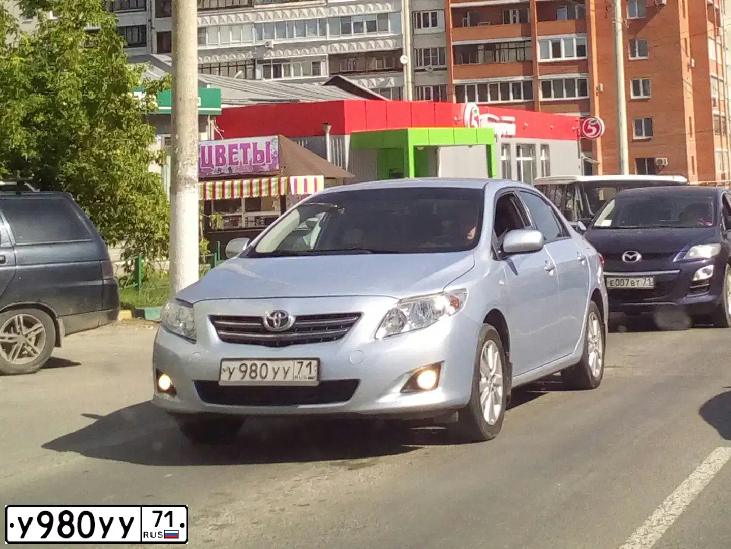 Фото автомобиля TOYOTA COROLLA, 2007 — госномер У980УУ71. Цвет: СВЕТЛО-ГОЛУБОЙ