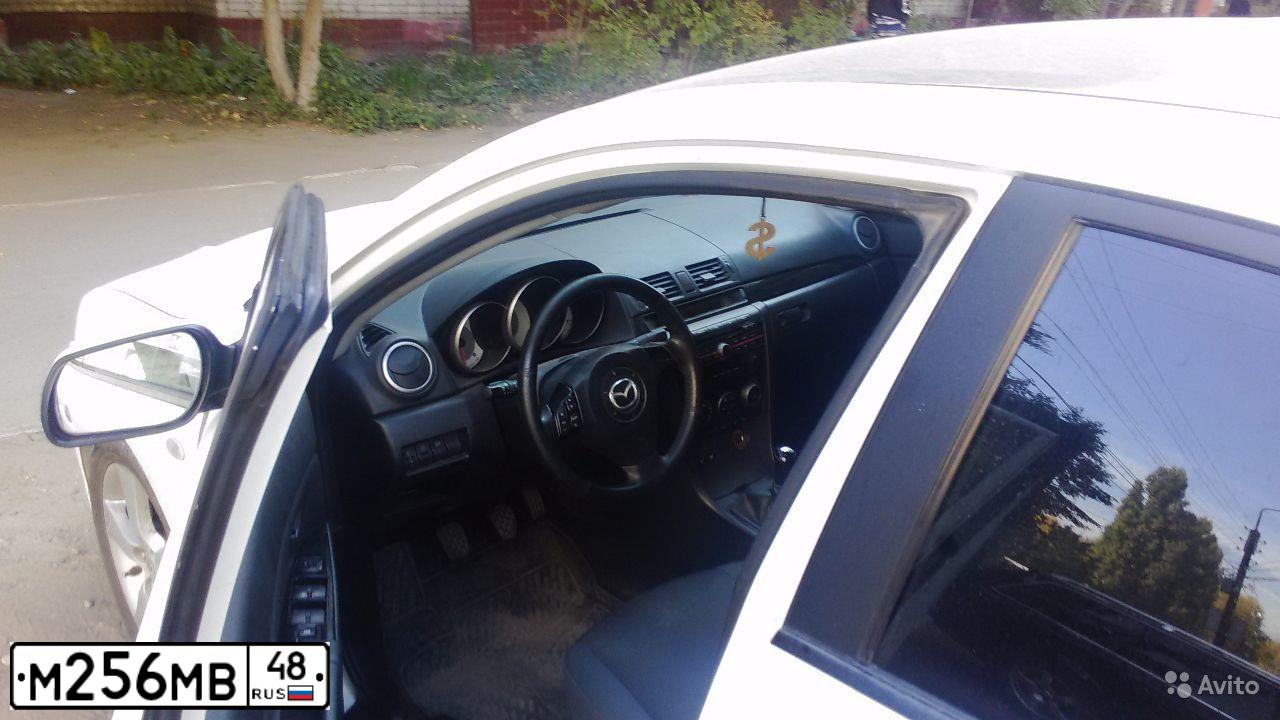 Фото автомобиля MAZDA A 3, 2008 — госномер Р557МО67. Цвет: Белый