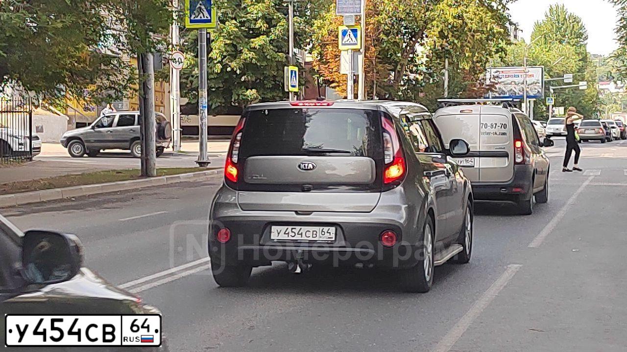 Фото автомобиля FORD FOCUS, 2007 — госномер О623СА64. Цвет: ЧЕРНЫЙ