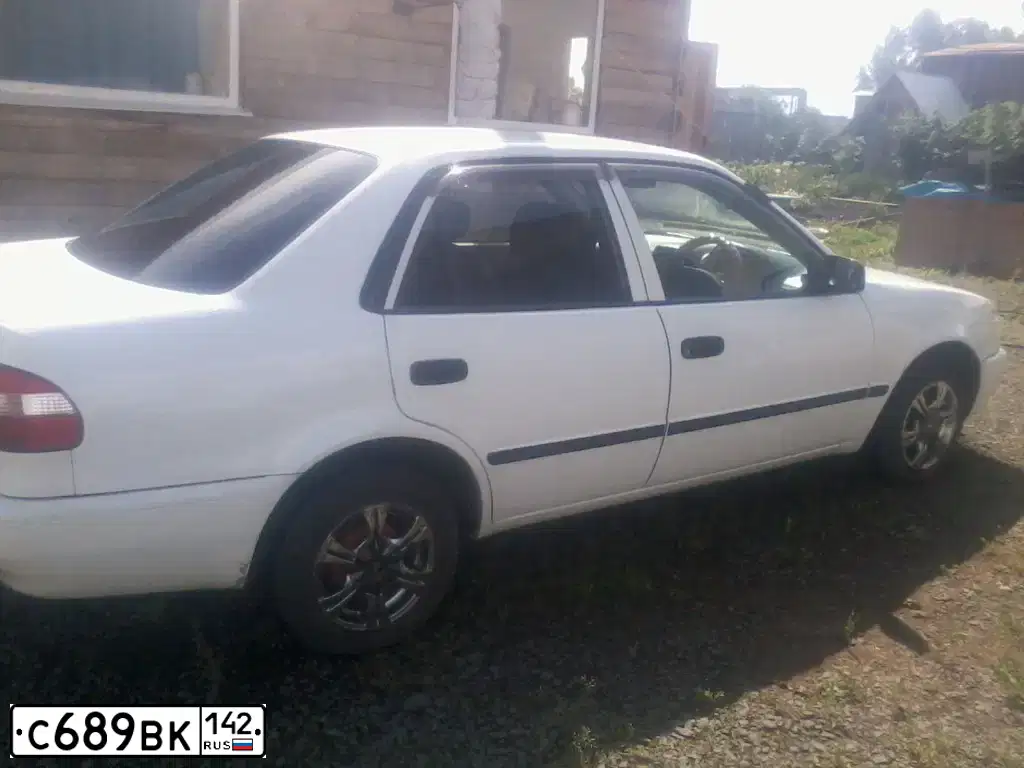 Фото автомобиля TOYOTA COROLLA, 1997 — госномер Н151ОХ124