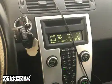 Фото автомобиля VOLVO C30, 2011 — госномер Х159МО197. Цвет: ОРАНЖЕВО-КРАСНЫЙ