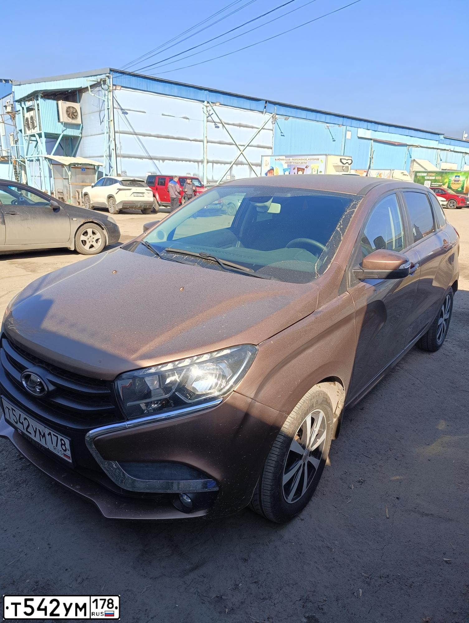 Фото автомобиля LADA XRAY, 2016 — госномер Т542УМ178. Цвет: СВЕТЛО-КОРИЧНЕВЫЙ