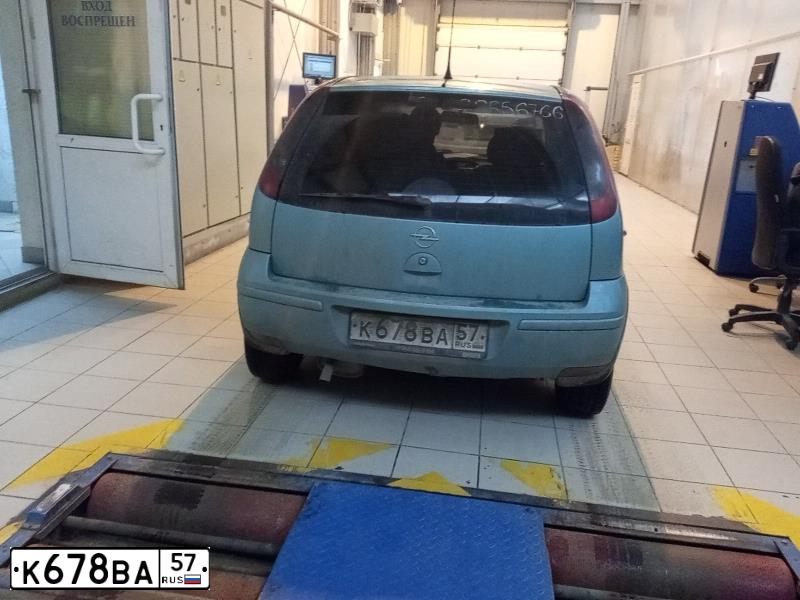 Фото автомобиля OPEL CORSA, 2004 — госномер О384ОК78. Цвет: бирюзовый