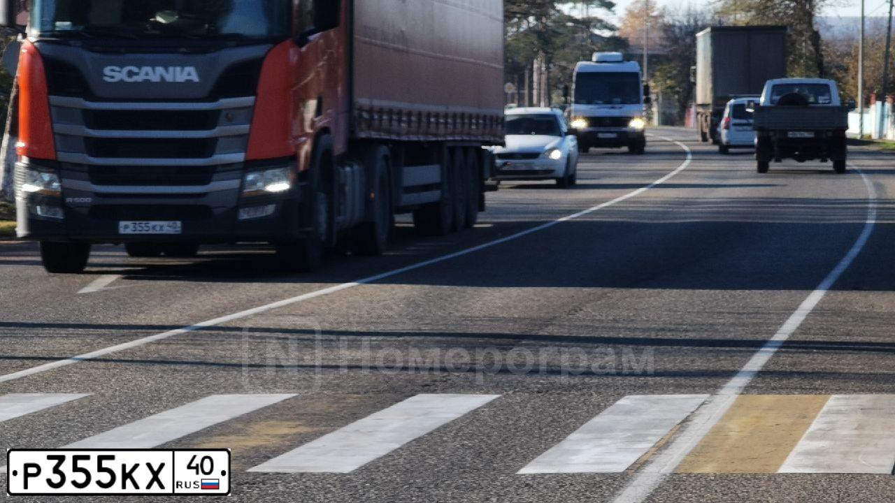 Фото автомобиля SCANIA SERIE R /4X2/, 2019 — госномер Е716ЕО716. Цвет: Оранжевый