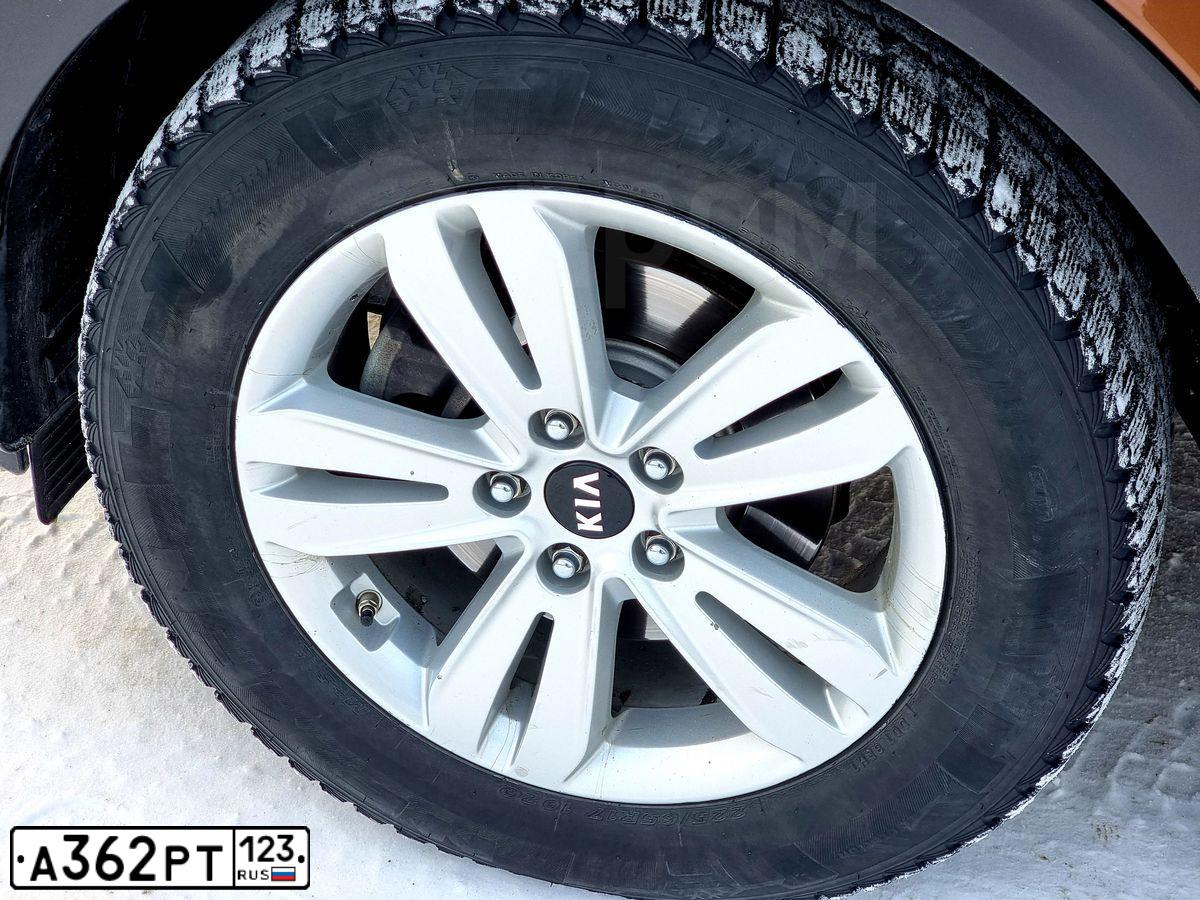 Фото автомобиля KIA SPORTAGE, 2016 — госномер Е505УУ702. Цвет: Коричневый