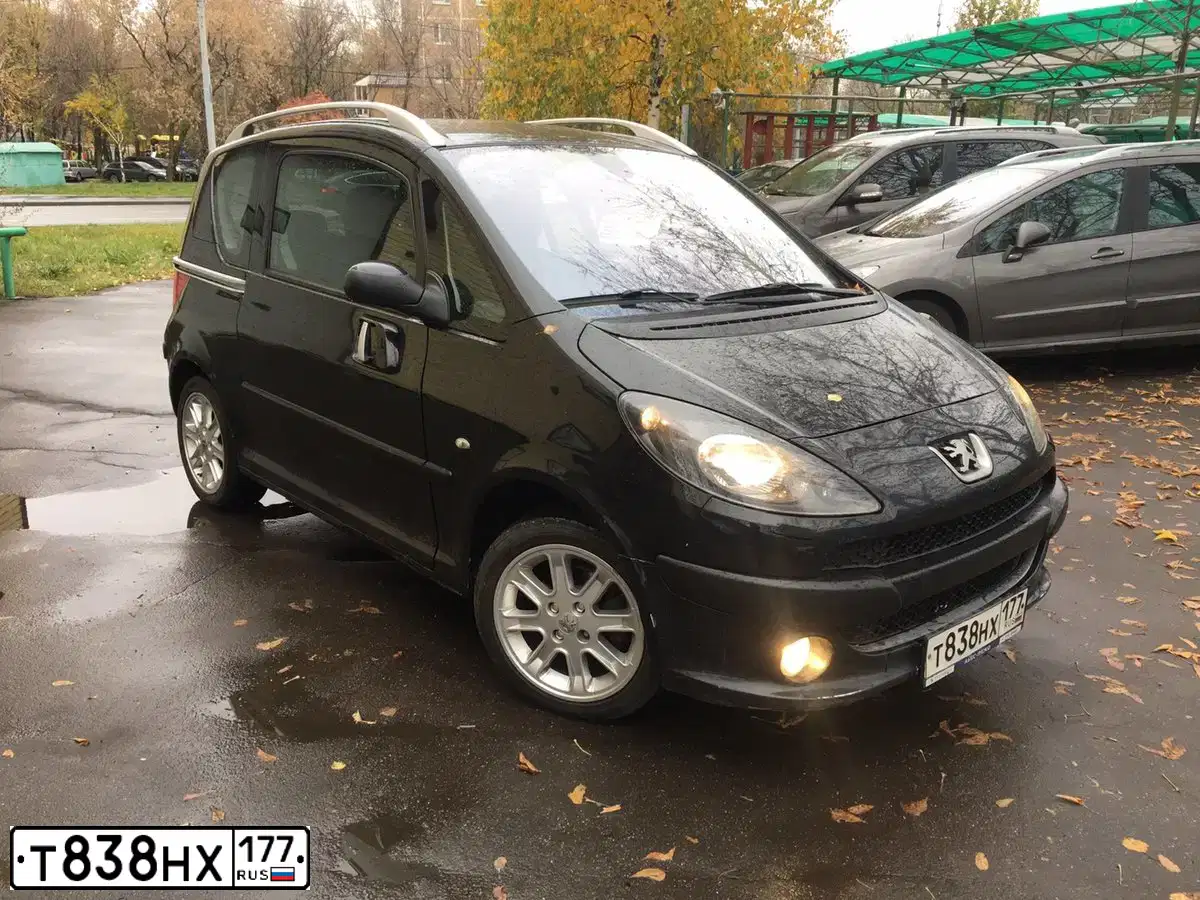 Фото автомобиля PEUGEOT 1007, 2006 — госномер Х852ТР69. Цвет: ЧЕРНЫЙ