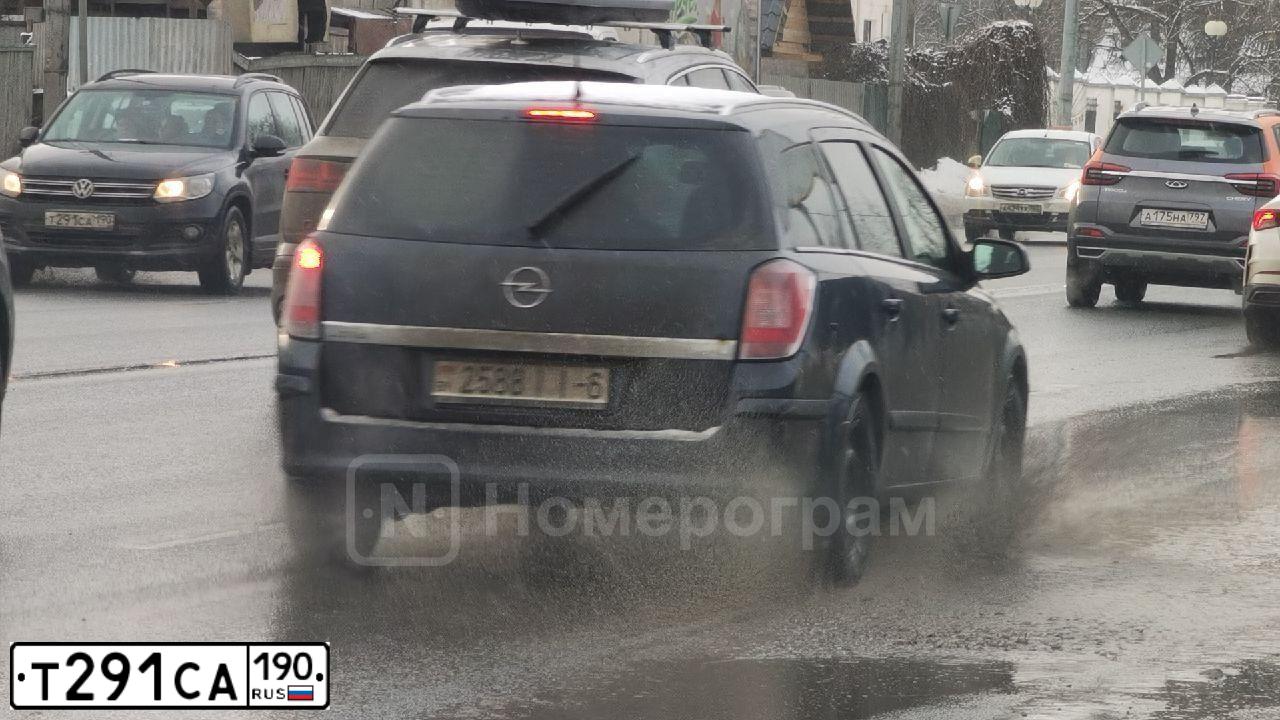Фото автомобиля VOLKSWAGEN TIGUAN, 2011 — госномер Т291СА190. Цвет: ЧЕРНЫЙ