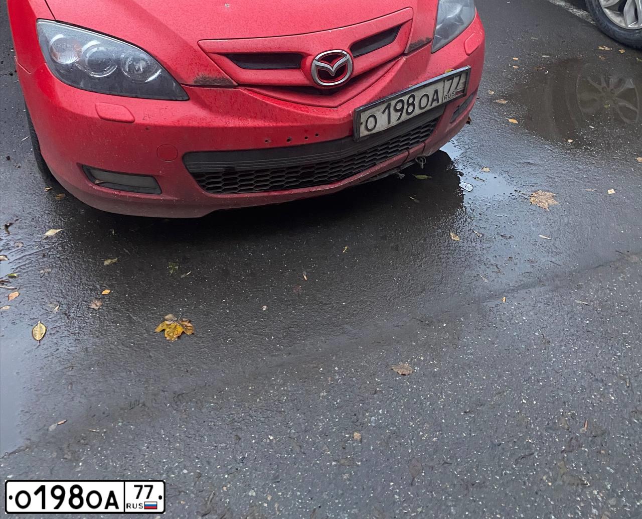 Фото автомобиля GAZ 3110 WOLGA, 2000 — госномер О198ОА77. Цвет: ЧЕРНЫЙ