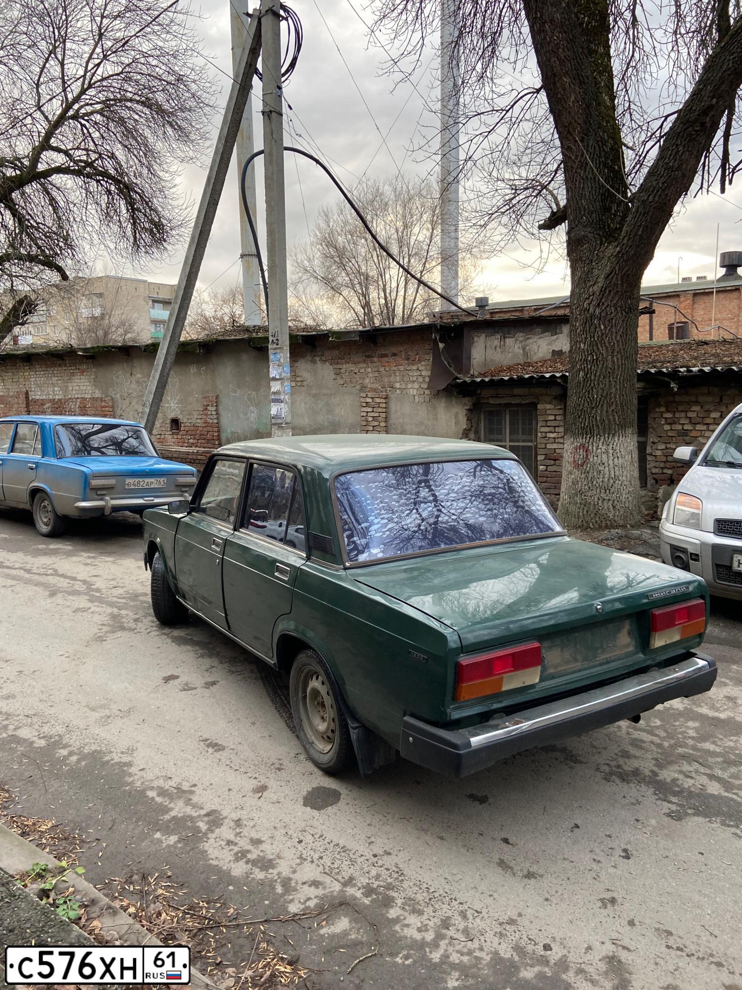 Фото автомобиля LADA 2107, 1999 — госномер Р180КВ61. Цвет: ЗЕЛЕНЫЙ