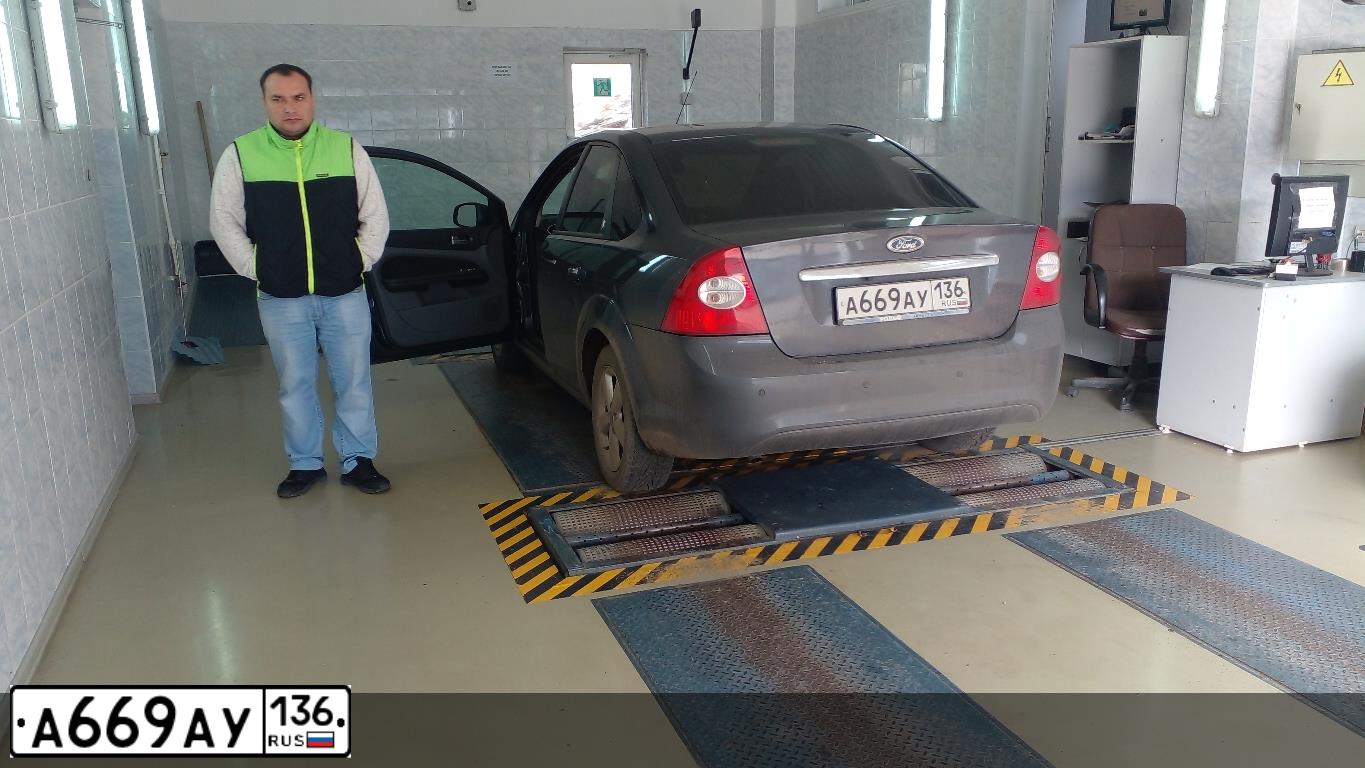 Фото автомобиля FORD FOCUS, 2009 — госномер А669АУ136. Цвет: ТЕМНО-СЕРЫЙ