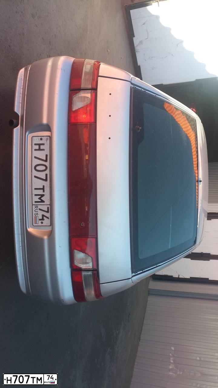 Фото автомобиля LADA 2112, 2006 — госномер Н707ТМ174. Цвет: СЕРЫЙ