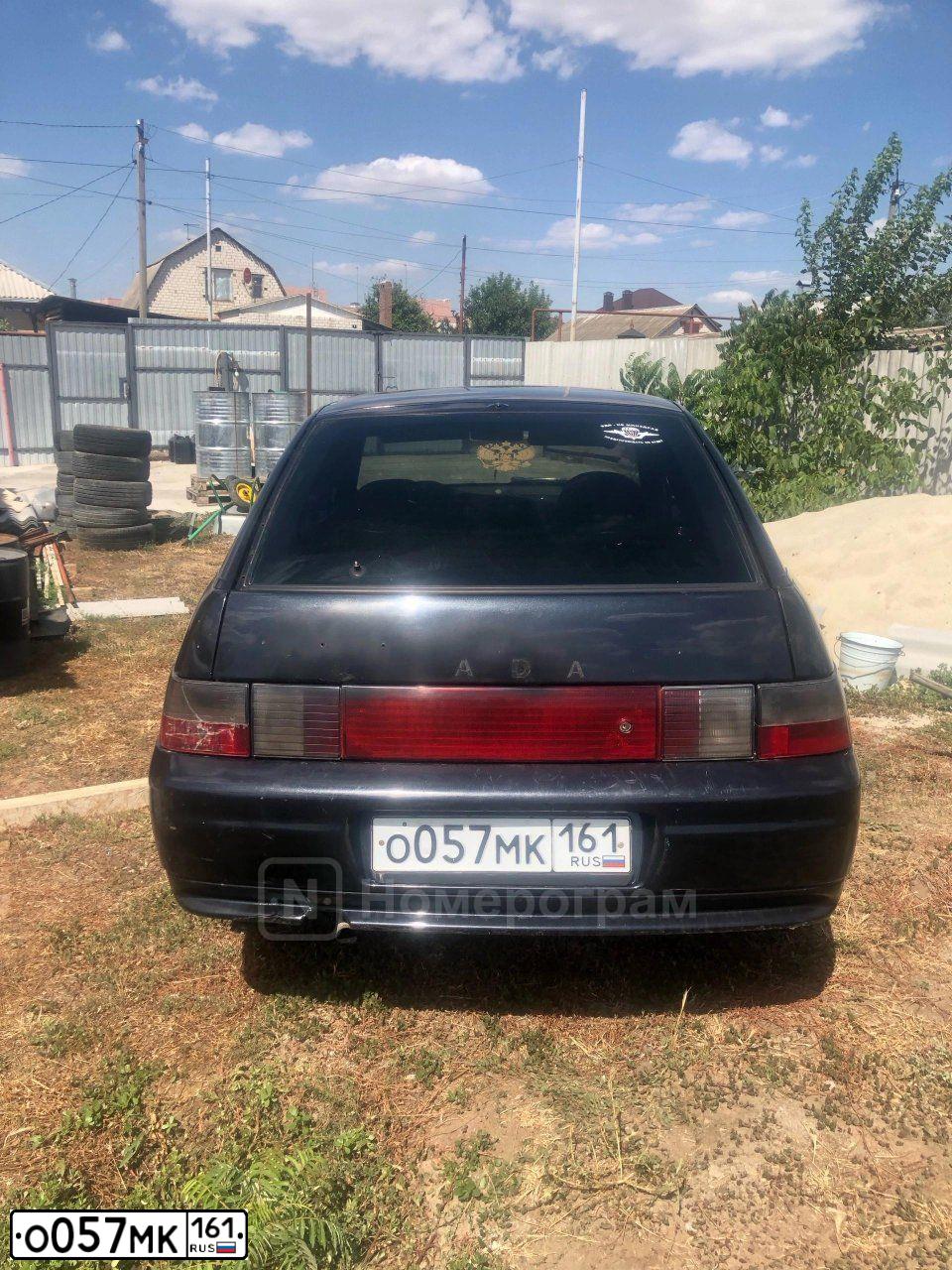 Фото автомобиля LADA 2112, 2006 — госномер О057МК161. Цвет: ЧЕРНЫЙ