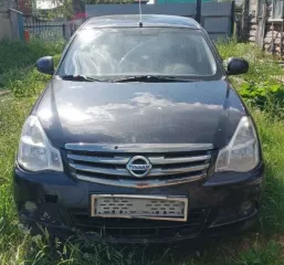 Фото автомобиля NISSAN ALMERA /AVTOVAZ/, 2014 — госномер Е271МА702. Цвет: ЧЕРНЫЙ