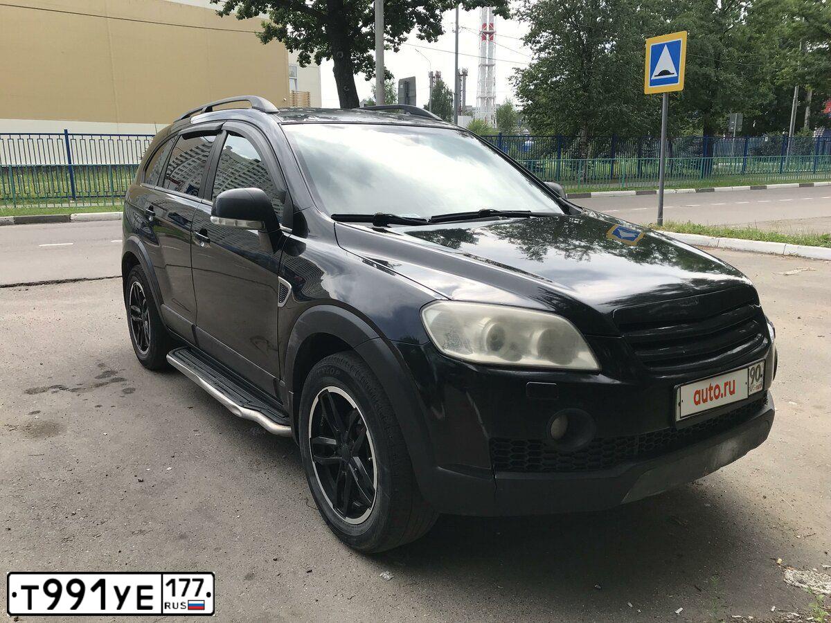 Фото автомобиля CHEVROLET CAPTIVA, 2007 — госномер Р170ТТ190. Цвет: ЧЕРНЫЙ
