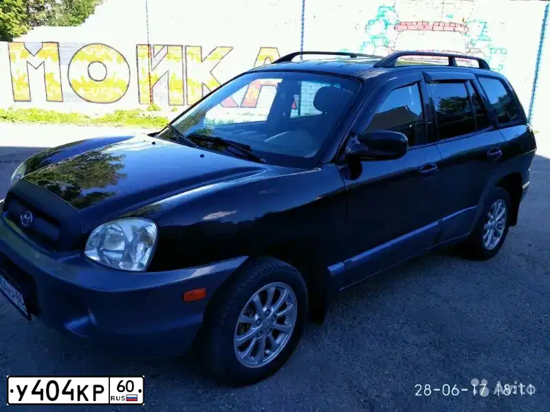 Фото автомобиля HYUNDAI SANTA FE, 2002 — госномер У404КР60. Цвет: ЧЕРНЫЙ