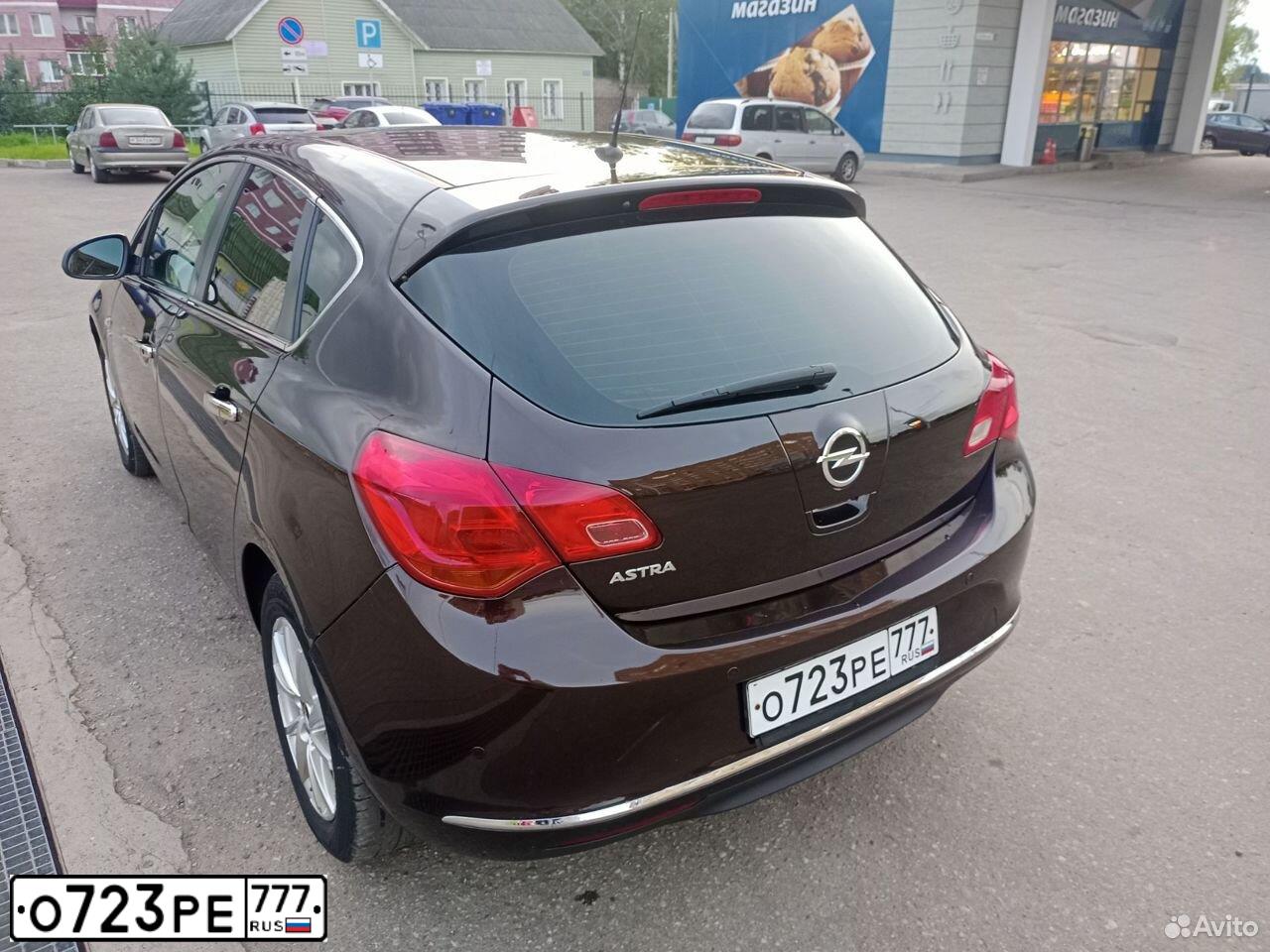 Фото автомобиля OPEL ASTRA, 2013 — госномер К977КС53. Цвет: КОРИЧНЕВЫЙ МЕТАЛЛИК