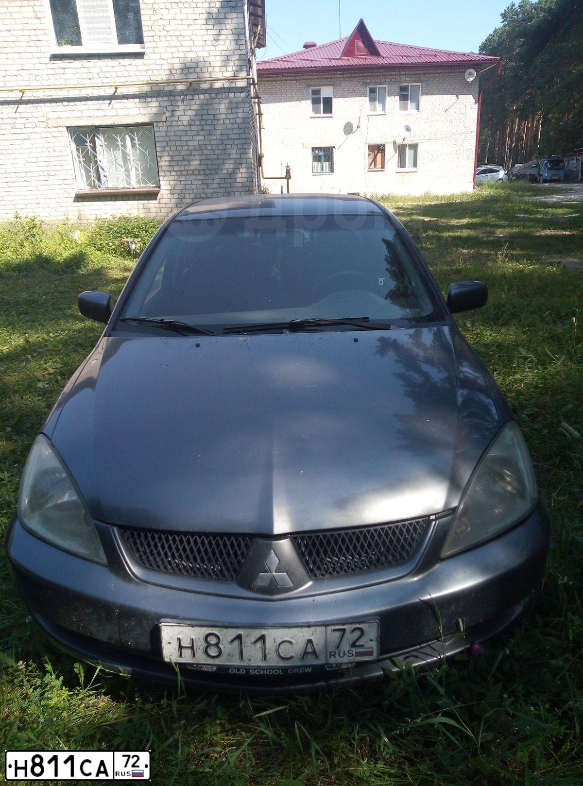 Фото автомобиля MITSUBISHI LANCER, 2006 — госномер У785КО72. Цвет: СЕРЫЙ