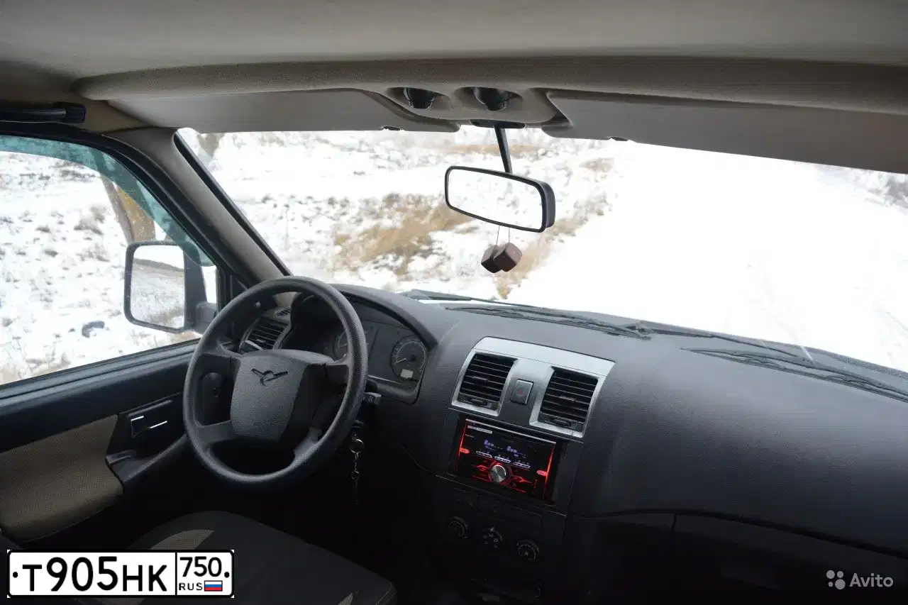 Фото автомобиля UAZ 2363 PICKUP, 2012 — госномер К303УМ190. Цвет: АВАНТЮРИН МЕТАЛЛИК