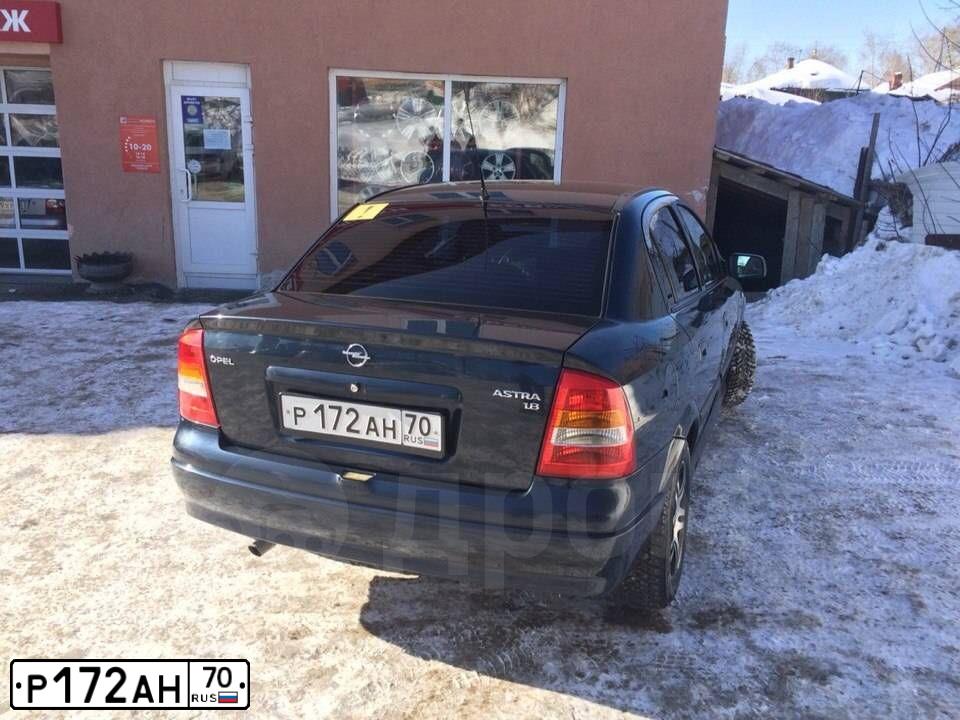 Фото автомобиля OPEL ASTRA, 2002 — госномер В770УМ70. Цвет: синий