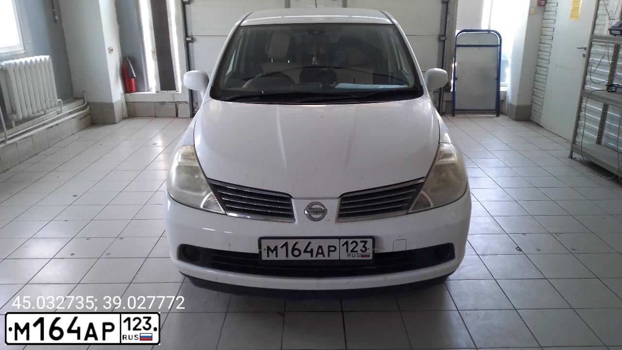 Фото автомобиля NISSAN TIIDA, 2005 — госномер М164АР123