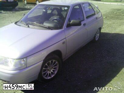 Фото автомобиля LADA 2112, 2004 — госномер Н459МС51. Цвет: СЕРЕБРИСТО-ЖЕЛТЫЙ